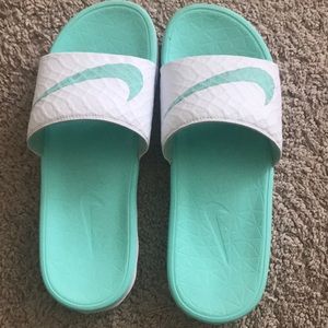 mint green nike slides